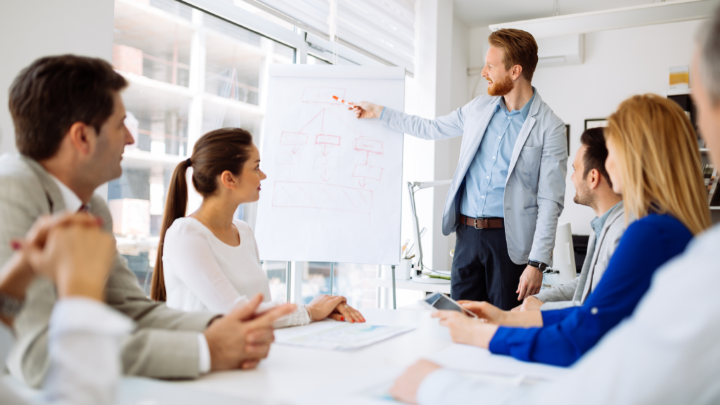 A Telefocal training instructor teaching telecom professionals in a classroom setting