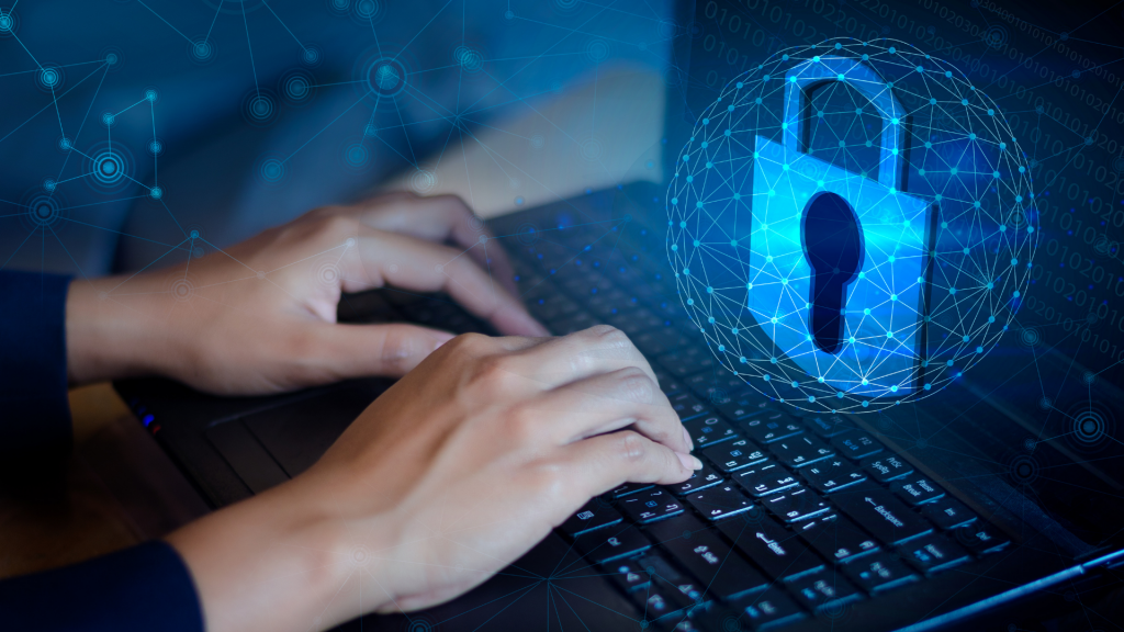 Telecom professional implementing cyber security on laptop