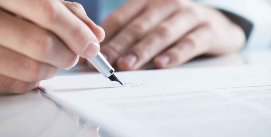 Businessman signing a contract