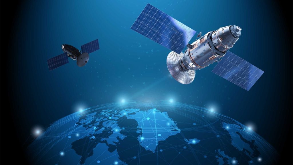 Satellites in space hovering above the earth enabling 5G NTN connectivity