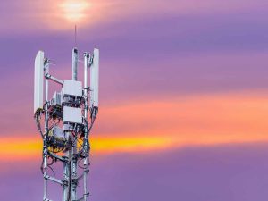 5G antenna and receiver against sunset background