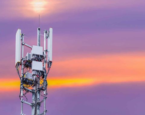5G antenna and receiver against sunset background