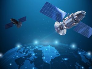 Satellites in space hovering above the earth enabling 5G NTN connectivity
