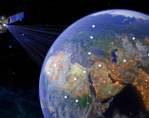 Satellite in orbit transmitting signals to points on earth