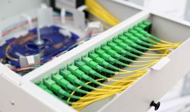 Fiber optic cables installed neatly in a cabinet for fiber to the home internet service FTTH