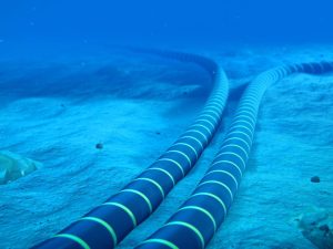 Submarine cables at the bottom of the ocean