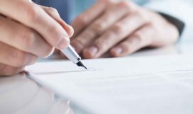 Businessman signing a contract