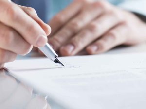 Businessman signing a contract