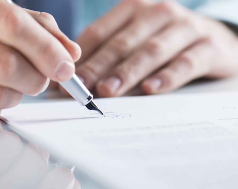 Businessman signing a contract