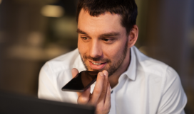 Telecom professional using voice call on mobile device