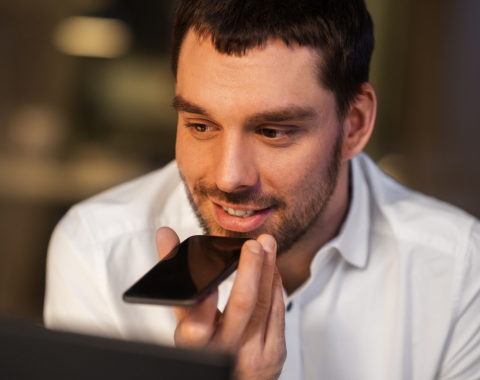 Telecom professional using voice call on mobile device